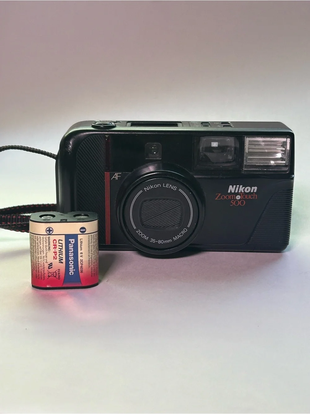Nikon Zoom Touch 500 Film Camera in Black with Red Accent
